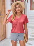 Double Take Ruched T-shirt in coral pink, with a solid knit, V-neckline, gathered front detail, and flutter sleeves.